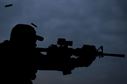 Tech. Sgt. Stephen Upton shoots an M-16 rifle at a firing range near Kabul, Afghanistan, Dec. 8, 2015. Upton is assigned to the Train, Advise, Assist Command-Air as a personal security detail member. (U.S. Air Force photo/Staff Sgt. Corey Hook)