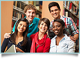 A diverse group of teens in school library. 