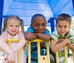 Photo of children in a playground fort.