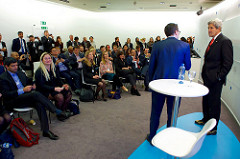 World Economic Forum Young Global Leaders Director John Dutton introduces U.S. Secretary of State John Kerry to a group of young business people on January 17, 2017, at the World Economic Forum in Davos, Switzerland. [State Department photo/ Public Domain]