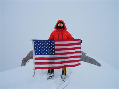 Capt. Stephen Austria, project engineer in the USACE-Alaska District&#39;s Foreign Military Sales Program, carried this American flag on his expedition climbing Denali this past summer. The flag was with Austria on every mission while deployed to Iraq. He said he hopes his climb helps raise Soldier suicide awareness. 