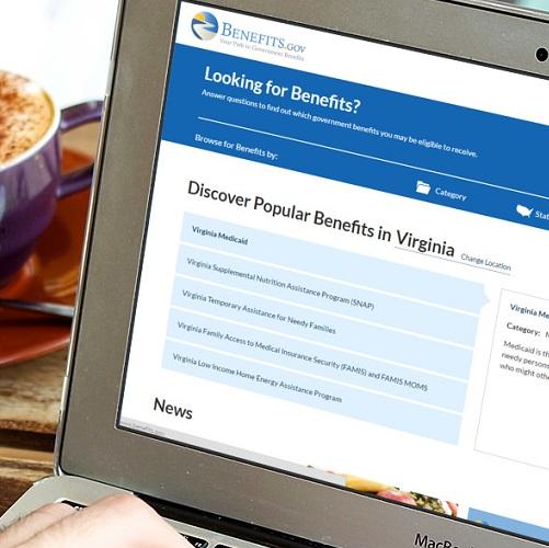 This is an image of someone using a computer to access Benefits.gov