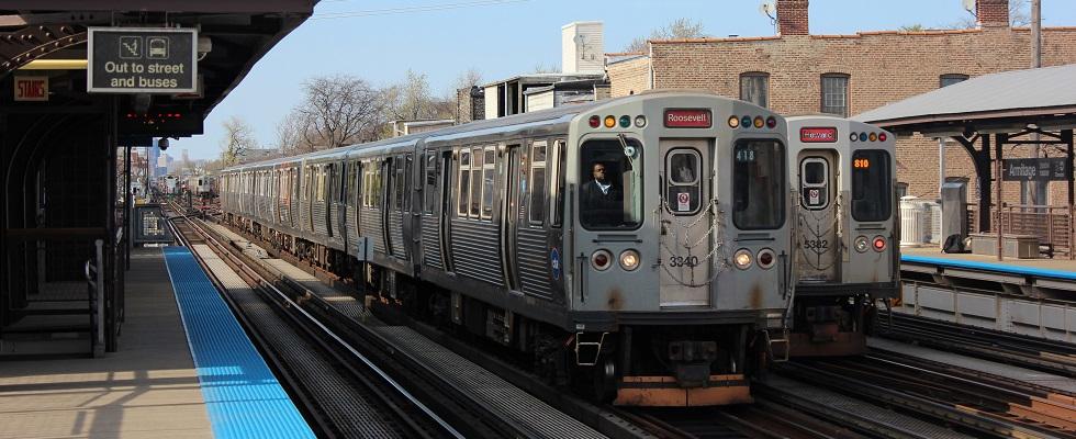 Two Chicago Transit Authority Red Line subway trains on platform