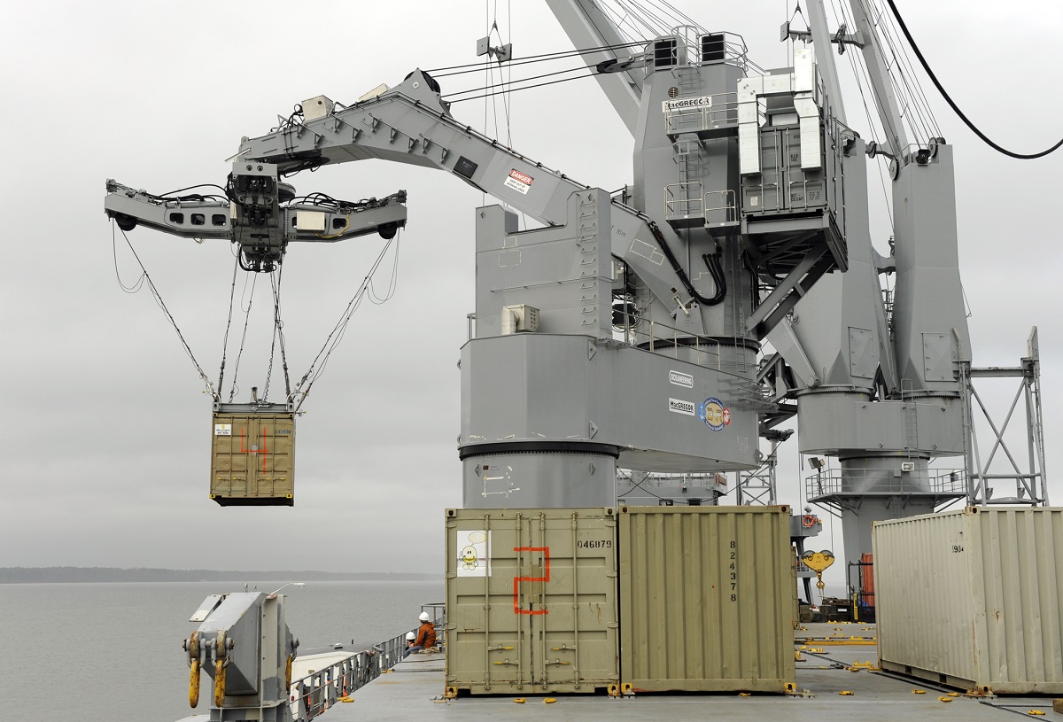 YORKTOWN, Va. (Nov. 19, 2009) A Large Vessel Interface Lift-on/Lift-off (LVI Lo/Lo) crane, funded by the Office of Naval Research, demonstrates container transfers aboard the Military Sealift Command auxiliary crane ship USNS Flickertail State (T-ACS-5) at Naval Weapons Station Yorktown, Cheatham Annex. The LVI Lo/Lo crane enables the rapid and safe transfer of standard ISO containers and other heavy loads at sea.