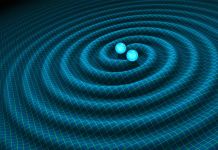Représentation artistique de deux boules bleues tournant en orbite et générant des ondes (R. Hurt/Caltech-JPL)
