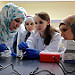 LANL researcher Cheryl Gleasner, center, demonstrates sample preparation and quality control techniques at the newly established Jordan University of Science and Technology Genomics Training Center.