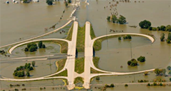 Photo of a flooded highway interchange.