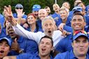 Comedian Jon Stewart, former host of The Daily Show, poses for a photo with the Air Force team during the 2016 Department of Defense Warrior Games in West Point, N.Y., June 15, 2016. Stewart emceed the opening ceremonies for the games. (Department of Defense photo/EJ Hersom)