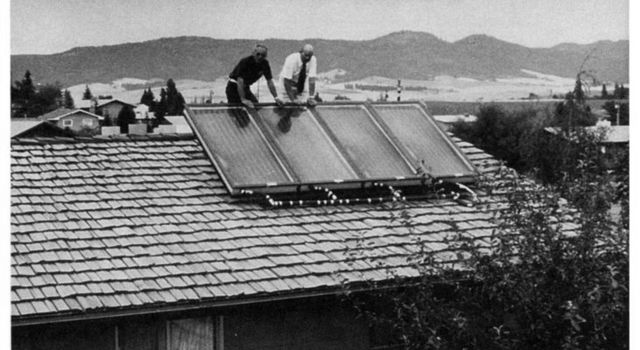 Solar water heater being installed on a home