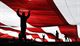 Airmen from Nellis and Creech Air Force Bases in Nevada, hold the American flag at Sam Boyd Stadium before the Las Vegas Bowl Dec. 17, 2016. The 25th Las Vegas Bowl saw Mountain West champion San Diego State rally by scoring 34 unanswered points to defeat Houston, 34-10. (U.S. Air Force photo/Airman 1st Class Kevin Tanenbaum)