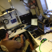Scientist, Eric Mooney, operates our ROV during its deployment using the live feed and the joy stick.