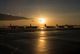 Several 36th Airlift Squadron C-130H Hercules' line the runway at Yokota Air Base, Japan, waiting for the next mission Dec. 23, 2016. (U.S. Air Force photo/Yasuo Osakabe)