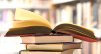 stack of books in a library