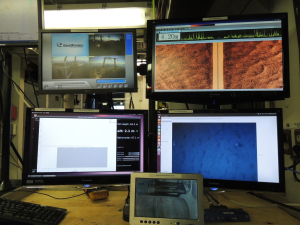 Views of the screens we monitor: from 6 o’clock, moving clockwise:  the winch, altitude monitor, cameras of back deck, sonar of the sea floor and photos being taken as we travel