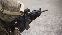 Capt. Ian Carter-Condon fires an M16A4 service rifle during table two of his annual rifle range qualification, Jan. 12, 2017, at Camp Hansen, Okinawa, Japan. The Marine Corps revised table two of the marksmanship program October 2016 to increase marksmanship skill and realism in a combat environment. Carter-Condon is an assistant operations officer with Combat Logistics Regiment-3, 3d Marine Logistics Group, III Marine Expeditionary Force. 