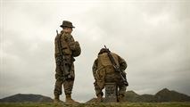 Marines await their turn to shoot the table two portion of their annual rifle range qualification, Jan. 12, 2017, at Camp Hansen, Okinawa, Japan. The Marine Corps revised table two of the marksmanship program October 2016 to increase marksmanship skill and realism in a combat environment. The Corps requires Marines to annually qualify at the range to determine their marksmanship skill. 