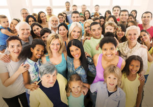 Large group of smiling people.