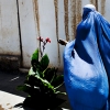 Afghan women visit the department for women's advancement in Pul-i-Kumri, Afghanistan. Deprived of jobs and government services, people in Baghlan Province turned to the Taliban for speedy justice and work. Photo Courtesy of the New York Times/Eros Hoagland