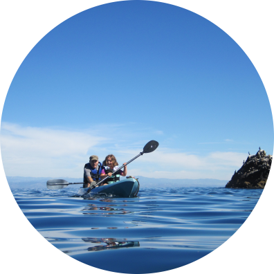 A father and daughter enjoy a kayak trip in NOAA's Channel Islands National Marine Sanctuary.