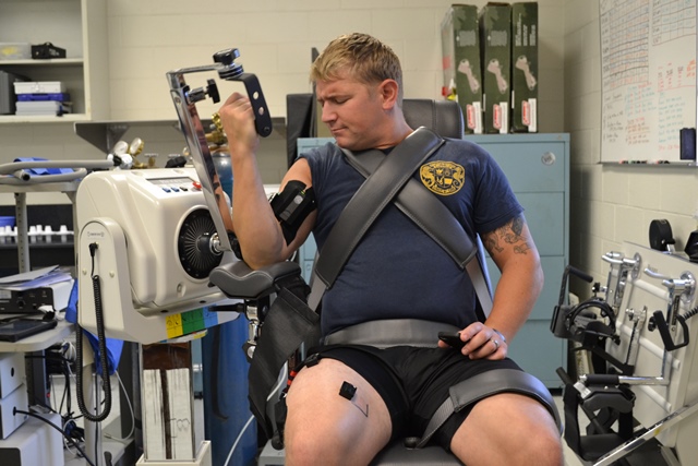 A diver performs physical exercises at the Navy Experimental Diving Unit (NEDU) in Panama City, Florida. Dr. John Florian, director of NEDU's Warfighter Human Performance Program, is conducting Office of Naval Research-sponsored work focusing on oxygen toxicity and fatigue in Navy divers. Photo provided by Dr. John Florian 