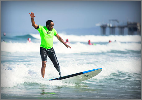 Photo of Veteran Rodney Blanton Surfing