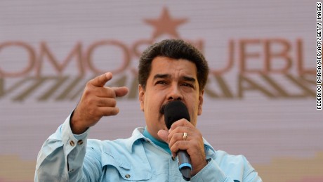 Venezuelan President Nicolas Maduro delivers a speech before supporters gathering outside the presidential palace in Caracas on March 18, 2015. Leaders from leftist Latin American regional bloc ALBA gathered Tuesday for a summit in Caracas, a show of support for Venezuela in its mounting standoff with the United States. AFP PHOTO/FEDERICO PARRA        (Photo credit should read FEDERICO PARRA/AFP/Getty Images)