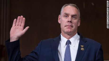 US Congressman Ryan Zinke, R-Montana, is sworn in before testifying before Senate Committee on Energy and Natural Resources on Capitol Hill in Washington, DC, January 17, 2017, on his nomination to be Secretary of the Interior in the Trump administration. / AFP / JIM WATSON        (Photo credit should read JIM WATSON/AFP/Getty Images)