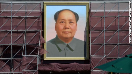 A portrait of the late Chinese leader Mao Zedong on Tiananmen Gate is seen undergoing renovation in Beijing on August 29, 2013.  The European Union urged China on August 28 to release prominent activist Xu Zhiyong and others who it said were being held &quot;for peacefully expressing their views.&quot;     AFP PHOTO/Mark RALSTON        (Photo credit should read MARK RALSTON/AFP/Getty Images)