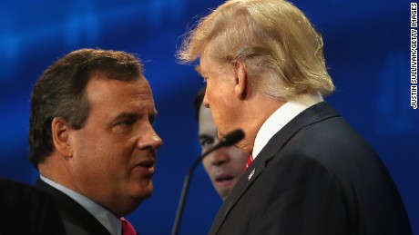 Presidential candidates Donald Trump (R) speaks with New Jersey Gov. Chris Christie during a break at the the CNBC Republican Presidential Debate at University of Colorados Coors Events Center October 28, 2015 in Boulder, Colorado.