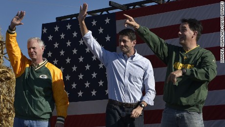 From left: Senator Ron Johnson, R-WI, House Speaker Paul Ryan, R-WI, and Wisconsin Governor Scott Walker wave at the end of the 1st Congressional District Republican Party of Wisconsin Fall Fest on October 8, 2016 at the Walworth County Fairgrounds in Elkhorn, Wisconsin.