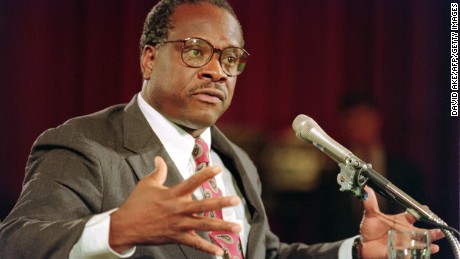 US Supreme Court nominee Clarence Thomas gestures, 10 September 1991, during confirmation hearings before the US Senate Judiciary Committee, in Washington D.C..