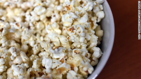 A picture taken on February 10, 2015 in Paris shows a bowl of popcorn. To most people, it may be just a fun food to munch while watching a movie.  But to a couple of French investigators, popcorn is a biomechanical enigma waiting to be explained.  In an unusual study published on February 11, engineers Emmanuel Virot and Alexandre Ponomarenko carried out experiments into what makes popcorn, well, pop.  Cameras recording at 2,900 frames per second helped show what happened when a kernel of corn strutted its stuff.      AFP PHOTO / LOIC VENANCE        (Photo credit should read LOIC VENANCE/AFP/Getty Images)