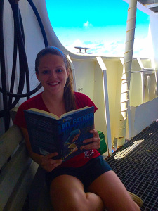 Chelsea Wegner reading "My Father, the Captain:  My Life with Jacque Cousteau"  by Jean Michel Cousteau  in her free time.  