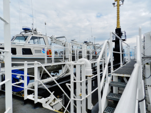 Launch vessels secured in starboard davits