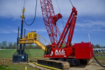 A 150-foot-tall crane turns an eight-foot-diameter auger performing deep-soil mixing at the Paducah Gaseous Diffusion Plantâ€™s southwest groundwater plume.  More than 260 borings are being made to a depth of about 60 feet to remove a source of trichloroethene groundwater contamination.