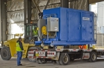 Fluor maintenance mechanic Robert Fulton lifts equipment at the C-337 former uranium enrichment process building at EM’s Paducah Site.