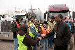 Dr. Vincent Adams congratulates crew members who prepared the first shipment of process gas equipment from the Portsmouth Site in early 2013.