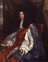 Painting of seated male figure, with long black hair wearing a white cape and breeches.