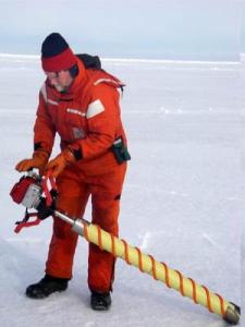 Dr. Ned Cokelet drills an ice core using a gas powered engine. It allows the scientists to take samples quickly and efficiently.