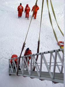 Ice samples were brought back onboard the Healy by attaching a rope and dragging them up the ramp.