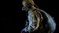 A U.S. Air Force master sergeant prepares for a high altitude low opening parachute jump aboard a C-130J Hercules, Nov.16, 2016. The aircraft is capable of operating from rough, dirt strips and is the prime transport for airdropping troops and equipment into hostile areas. (U.S. Air Force photo/Staff Sgt. Kenny Holston)