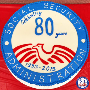 A cake that has the 80th Social Security seal frosted on it