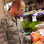 Service member shopping at commissary