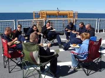 With plates laden, the crew and scientists alike sit down for a glorious evening on board the HEALY.