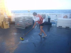 Here I am on the fantail of the deck scrubbing the mackrel blood after setting 180 traps. 