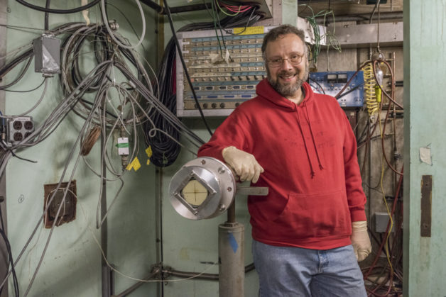 Photo - Lee Bernstein, who leads the Nuclear Data Group in Berkeley Lab’s Nuclear Science Division, at the beam line in Cave 0 of the Lab’s 88-Inch Cyclotron. (Credit: Marilyn Chung/Berkeley Lab)