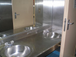 The head in the bunkhouse is equipped with two sinks.