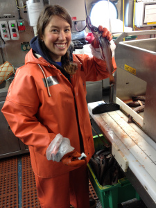 Me learning to measure the length of a Pollock.  Photo Credit:  Patrick Ressler