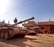 IS lights smokescreen against regime raids in east Syria: monitor