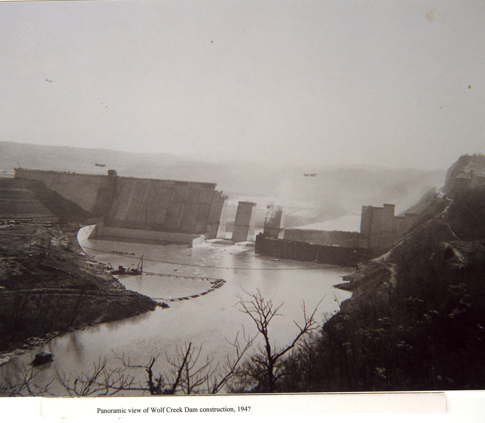 Overview photograph of the construction of Wolf Creek Dam at Lake Cumberland